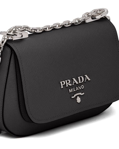 prada saffiano bags on sale|More.